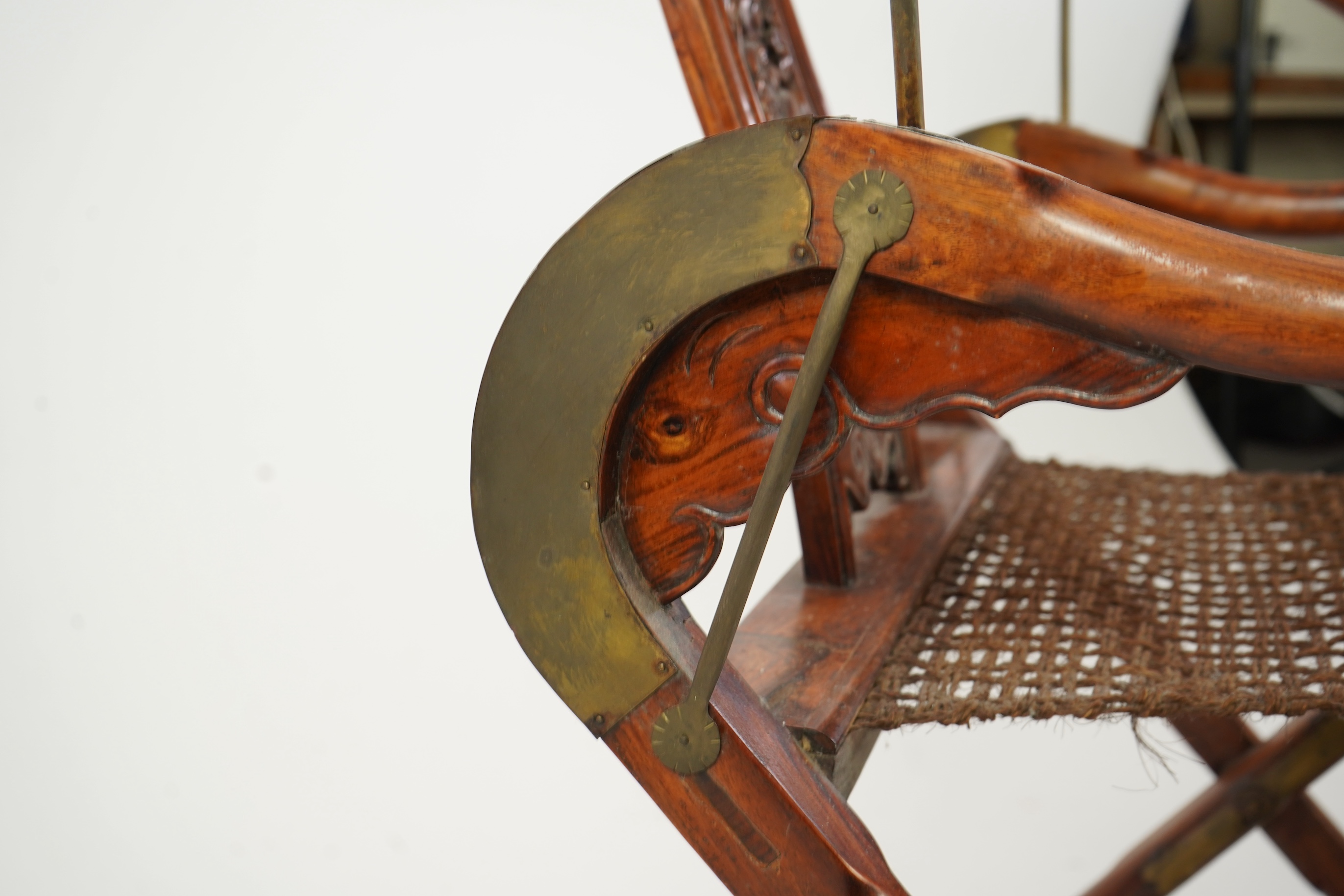 A Chinese huanghuali, hongmu and brass mounted folding hunting chair, jiaoyi, early 20th century